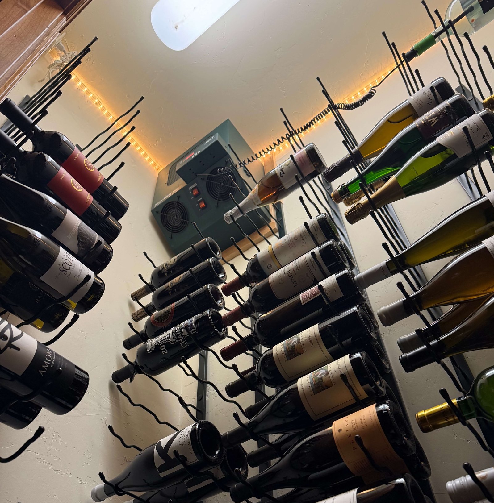 Air Dynamics of Tulsa technician diagnosing an HVAC issue during a service call.